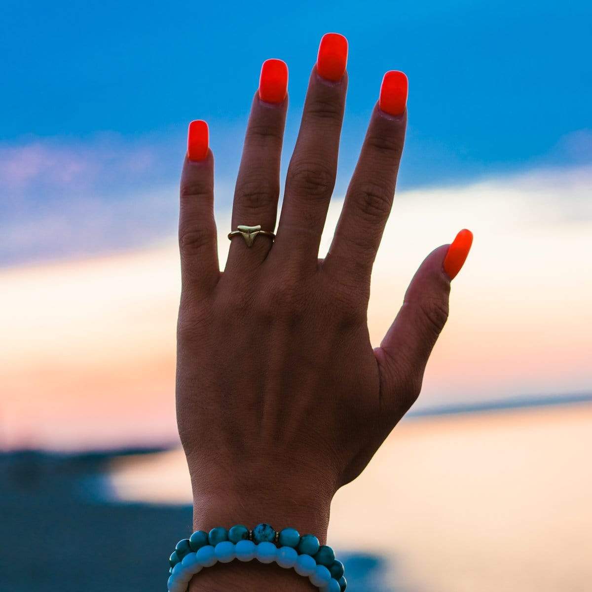 Shark Tooth Ring In Gold On Female Hand